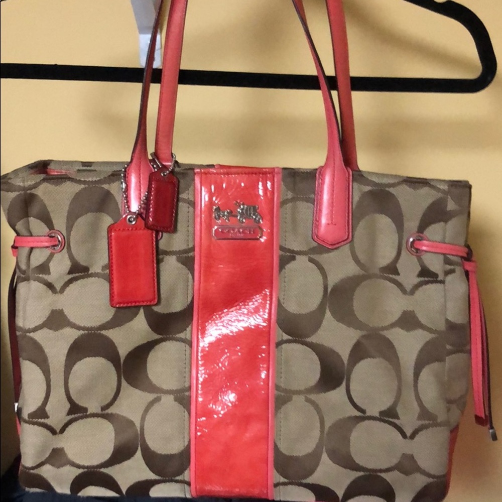 Authentic Coach signature canvas handbag.